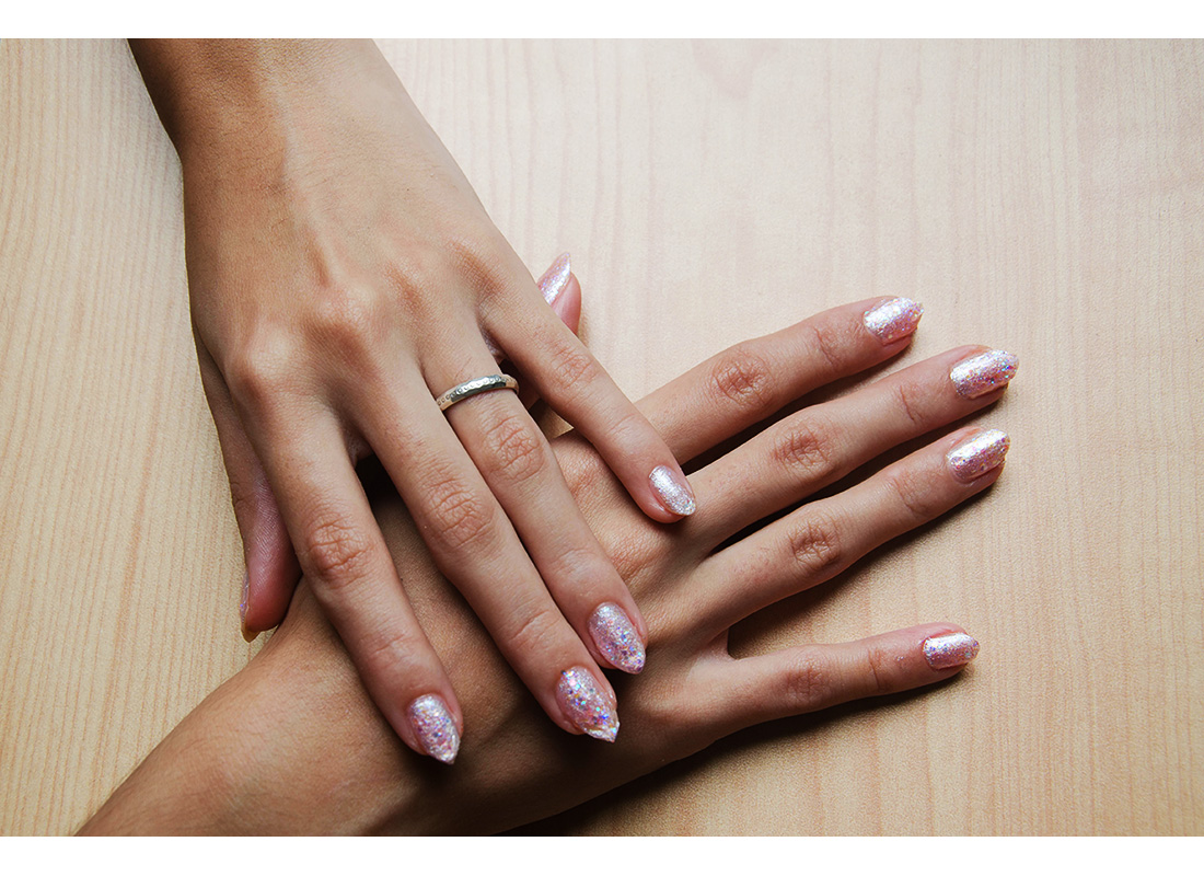 woman's manicured hands