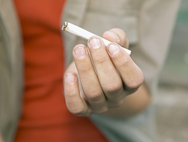 teen-boy-holding-cigarette.jpg