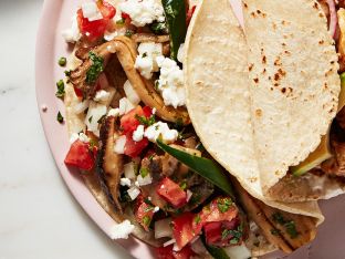 mushroom and poblano taco with pico de gallo on plate