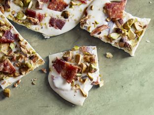pistachio-bacon bark on green counter