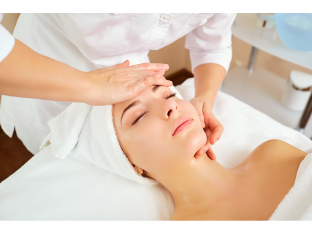 Woman getting facial peel