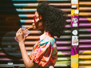 girl sipping her drink