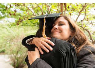 Mom with high school graduate