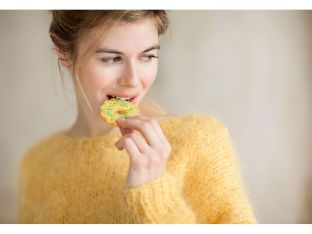 woman eating cookie