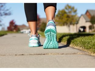 woman walking in neighborhood