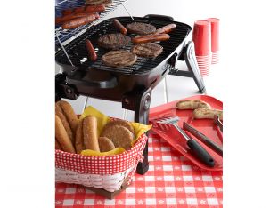 hot dogs and burgers on the grill