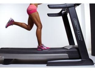 woman running on treadmill