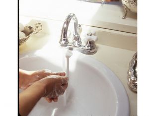 woman washing hands