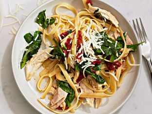 chicken fettuccine on white plat