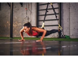 woman doing trx pushup