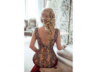 woman with elaborate braid in formal gown