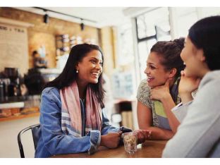 friends talking at coffee shop