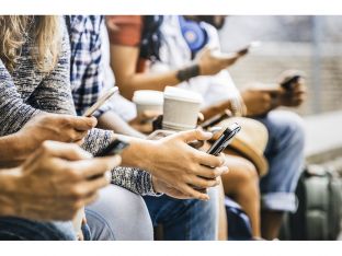 anonymous group of teens using phones