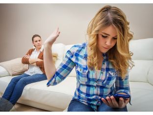 teen girl on phone ignoring mother