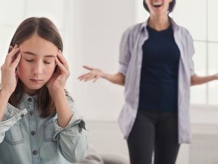 teen girl ignoring her mom at home