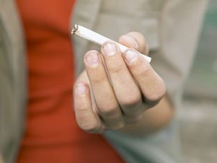 teen-boy-holding-cigarette.jpg
