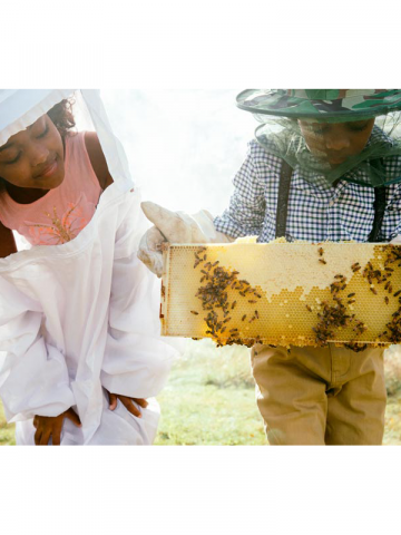 Children making honey