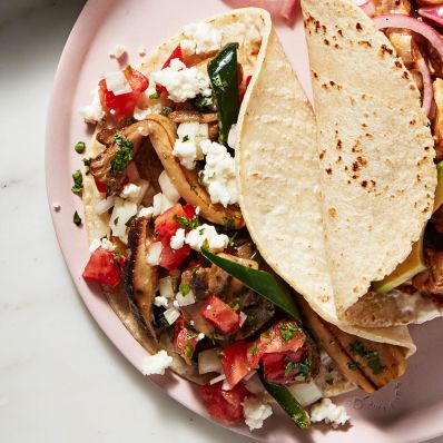 mushroom and poblano taco with pico de gallo on plate