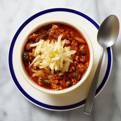 chili in bowl topped with cheese