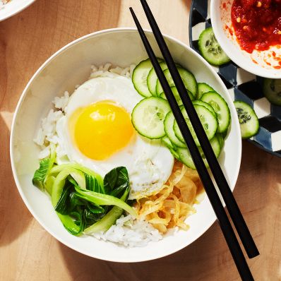 rice and veggie bowl chopsticks egg breakfast
