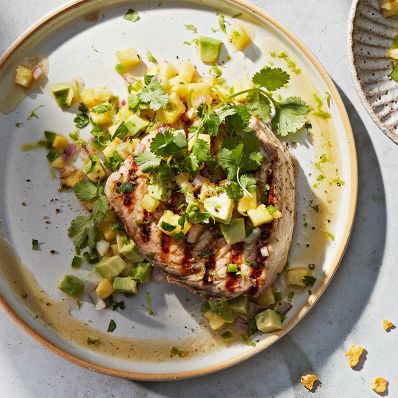 grilled swordfish with salsa on plate