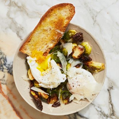 poached egg with brussels sprouts and parmesan
