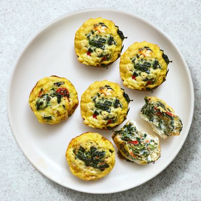 egg cups with vegetables and feta cheese