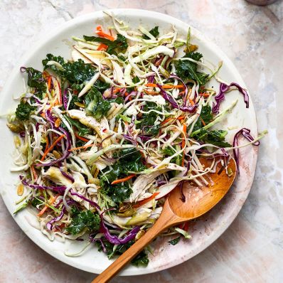apple-chicken slaw and spoon
