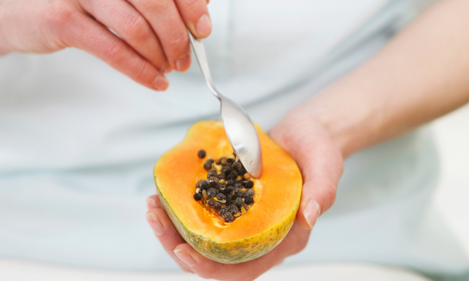 eating papaya