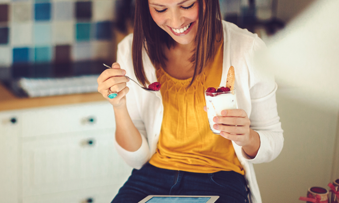 woman eating yogurt