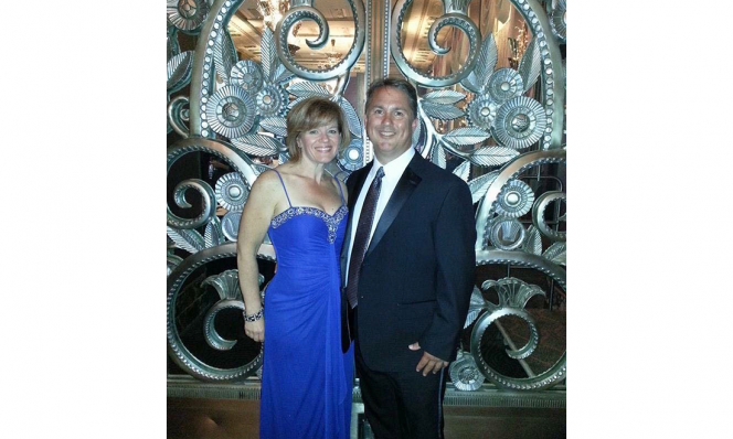 Wendy Rowland and Husband Blue Dress