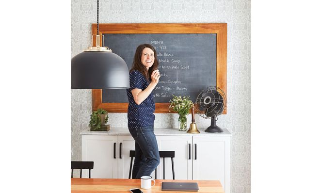 Melissa Coleman at chalkboard