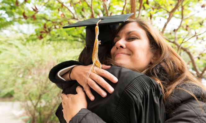 Mom with high school graduate