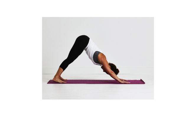 woman doing downward facing dog