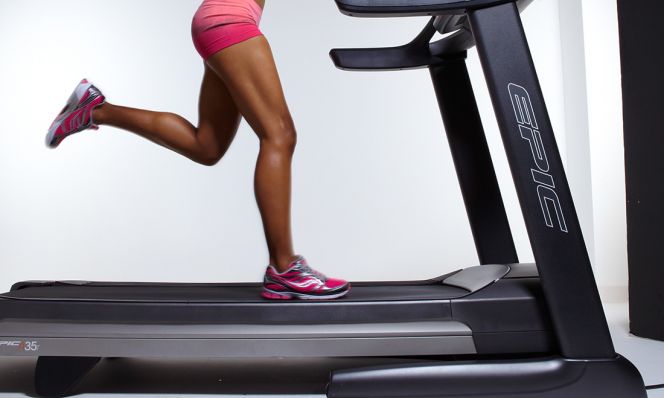 woman running on treadmill