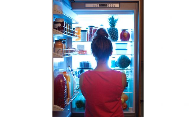 woman looking for a snack