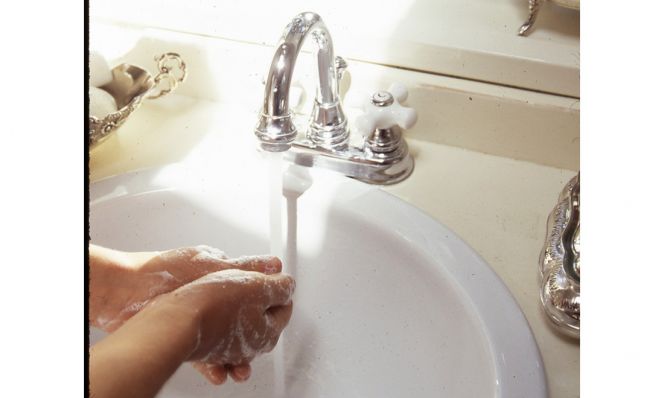 woman washing hands