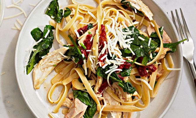 chicken fettuccine on white plat