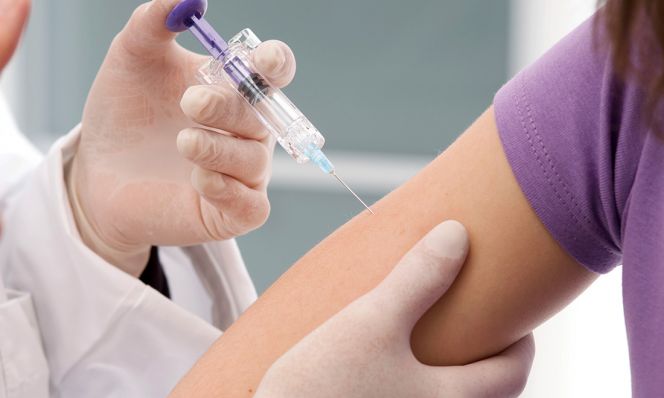 person getting vaccinated