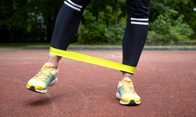 woman using resistance bands