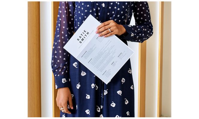 woman holding resume