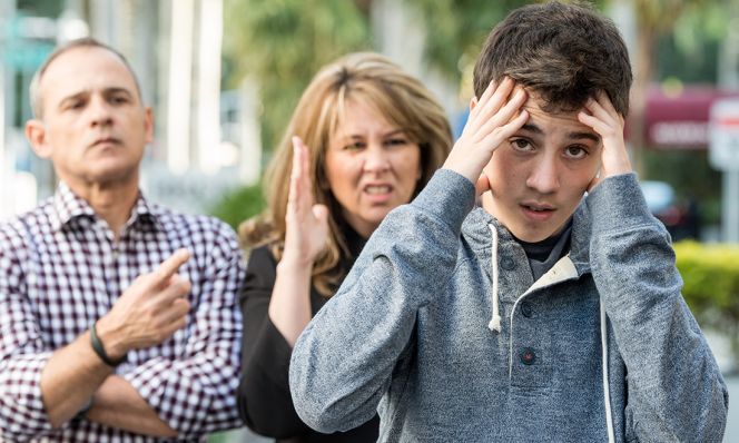 teen boy in trouble with parents
