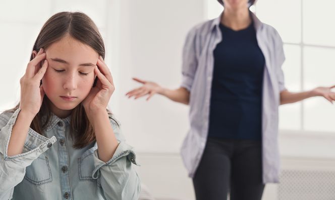 teen girl ignoring her mom at home